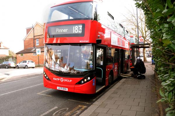 Mobility scooter boarding bus via ramp